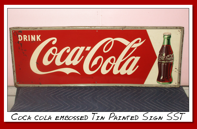 Coca Cola embossed tin painted sign. SST. Fish tail design 